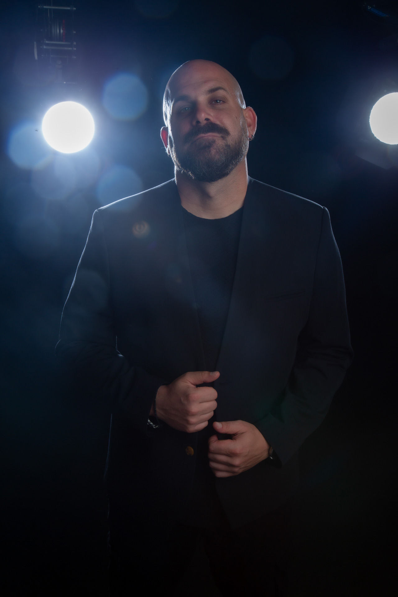 Portrait with jacket and stage lights